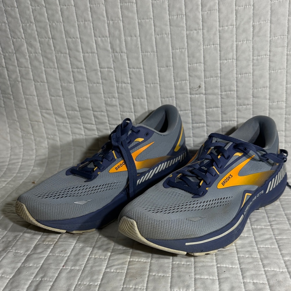 Brooks Men's Adrenaline GTS 23 running shoes in the Grey/Crown Blue/Orange